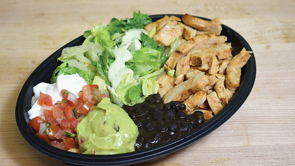 Taco Bell’s Cantina Power Bowl with Chicken with reduced-fat sour cream weighs in at 460 calories photo courtesy of Taco Bell