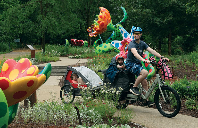Exploring the Crystal Bridges Museum of American Art Orchard Trail, featuring Flowers by artist Yayoi Kusama