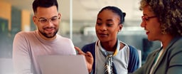 happy couple going over insurance information
