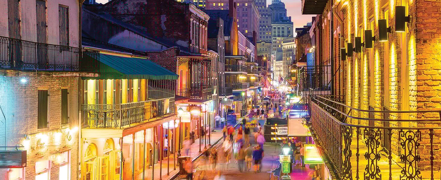Pubs and bars with neon lights in the French Quarter, New Orleans; photo by f11photo