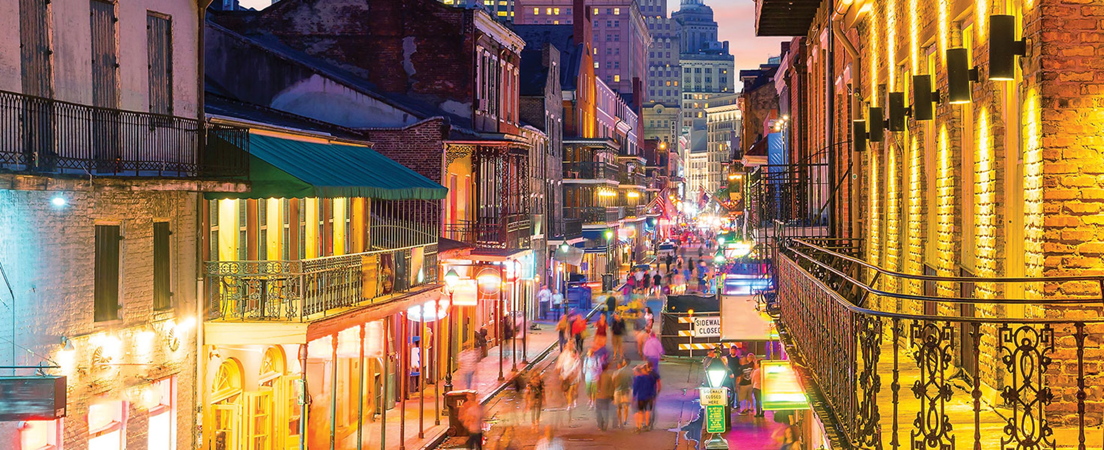 Pubs and bars with neon lights in the French Quarter, New Orleans; photo by f11photo