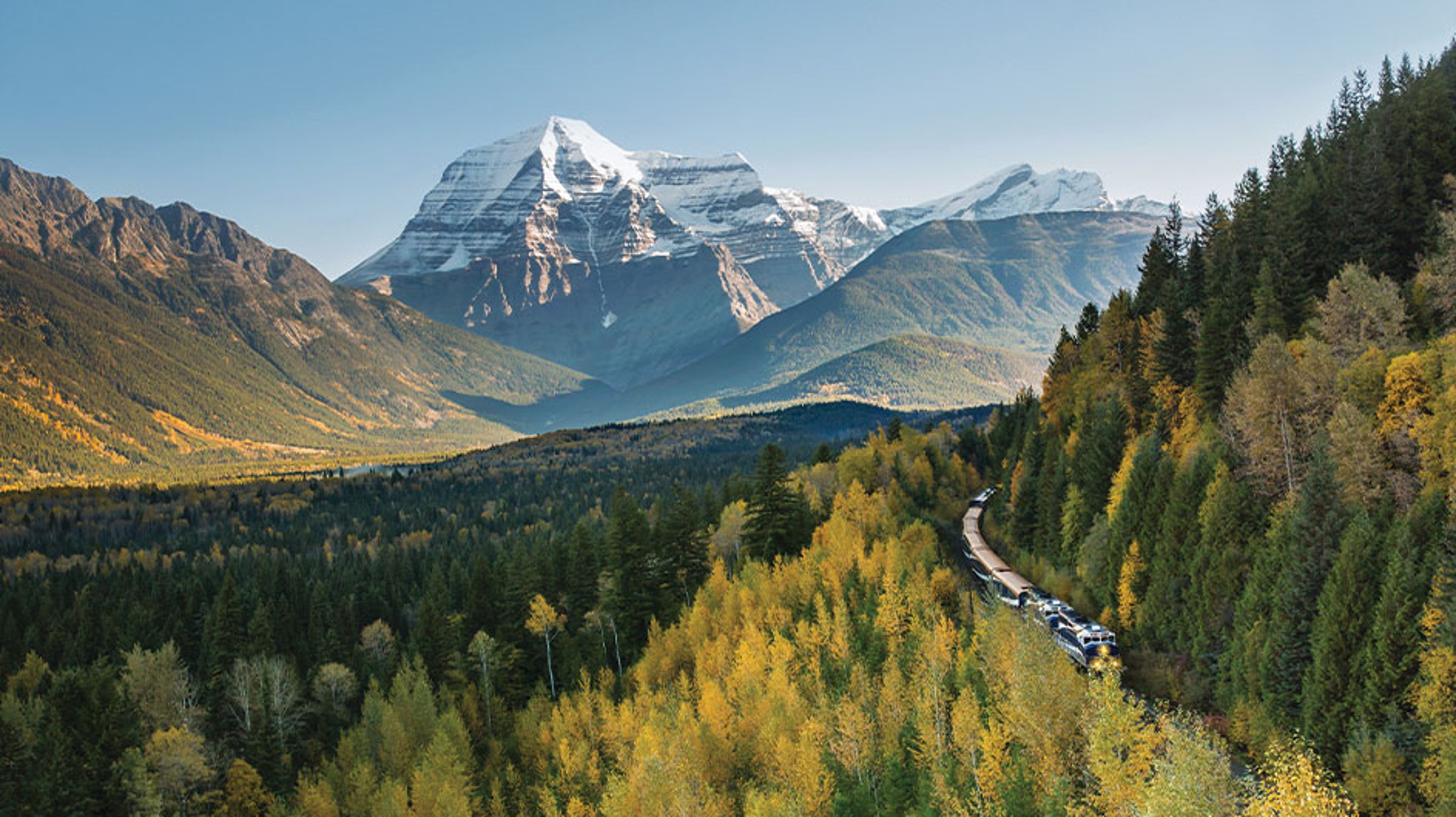 Rocky Mountaineer train traveling through mountain