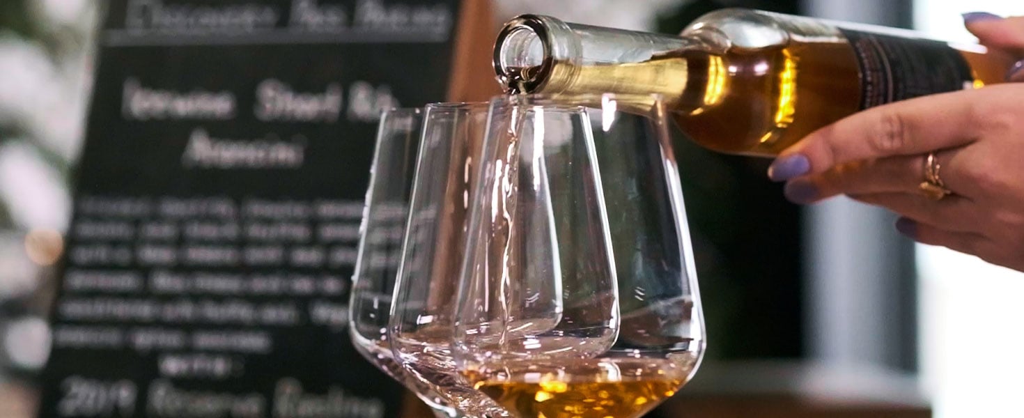 pouring wine into a glass