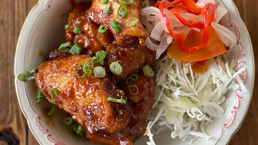 sweet and tangy sticky wings made by Chef Timon Balloo of The Katherine, Fort Lauderdale, Florida