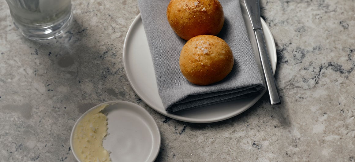 honey butter and bread on plate