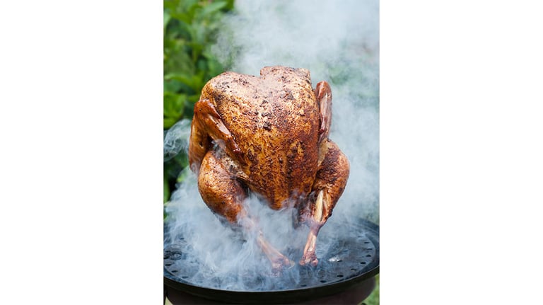 Whole turkey coming out of the smoker. Credit: rudisill