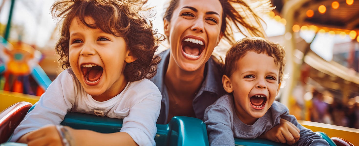 Mother with sons on a roller coaster