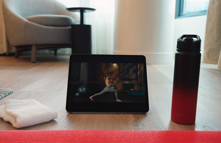 Online yoga class shown on a tablet 