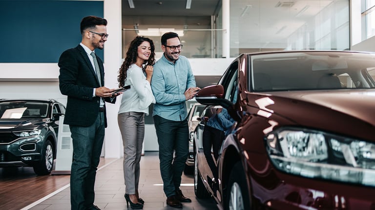 people buying a new car