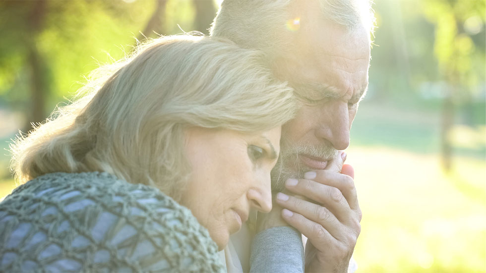 Older couple supporting each other
