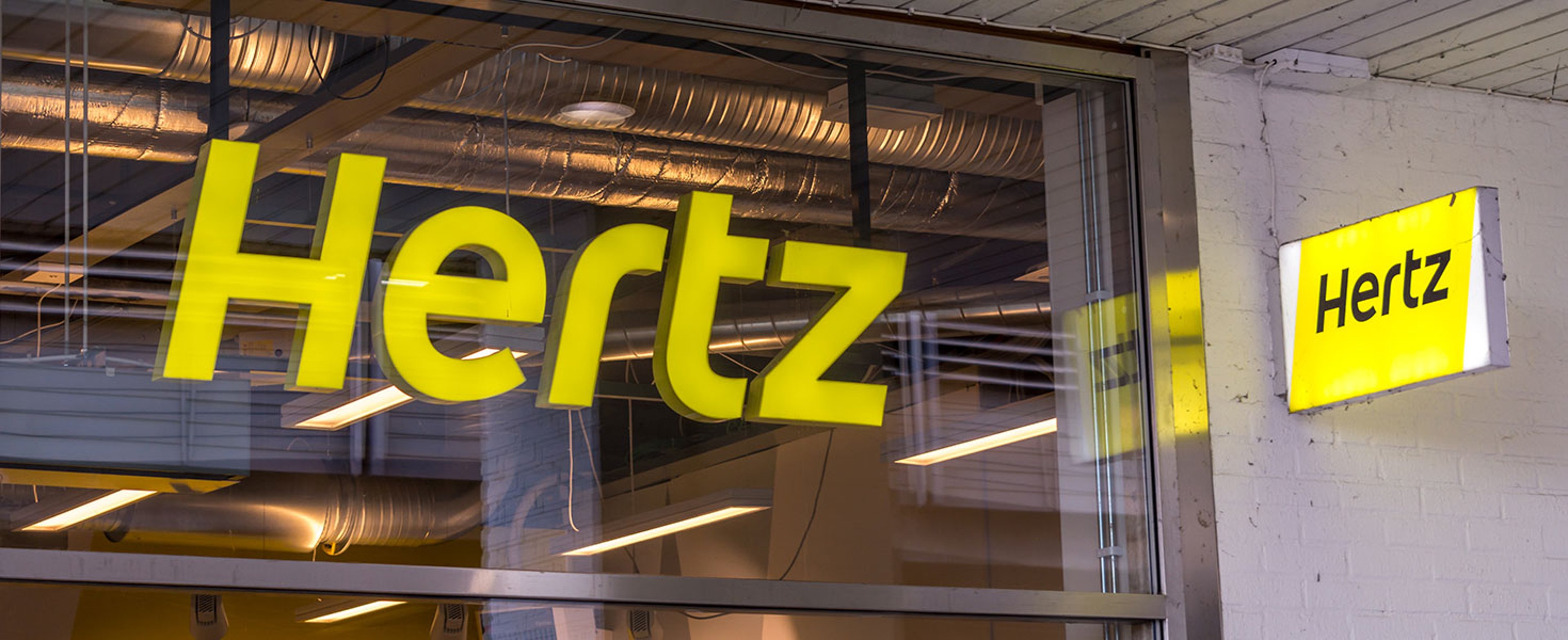 Logo of car rental company Hertz in Nordstan by vartox