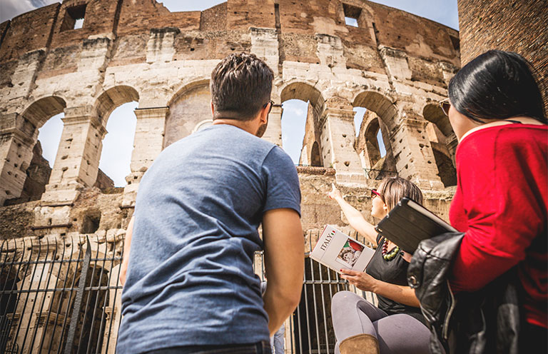 people having a guided tour on Rome colosseum