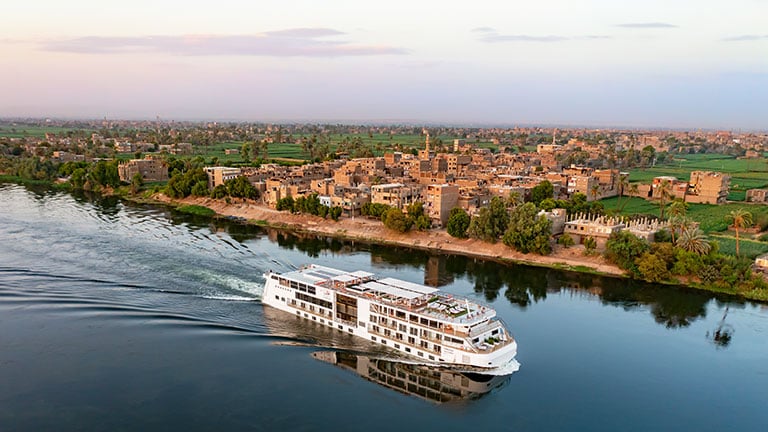 Osiris Ship Sailing Past Village Nile River