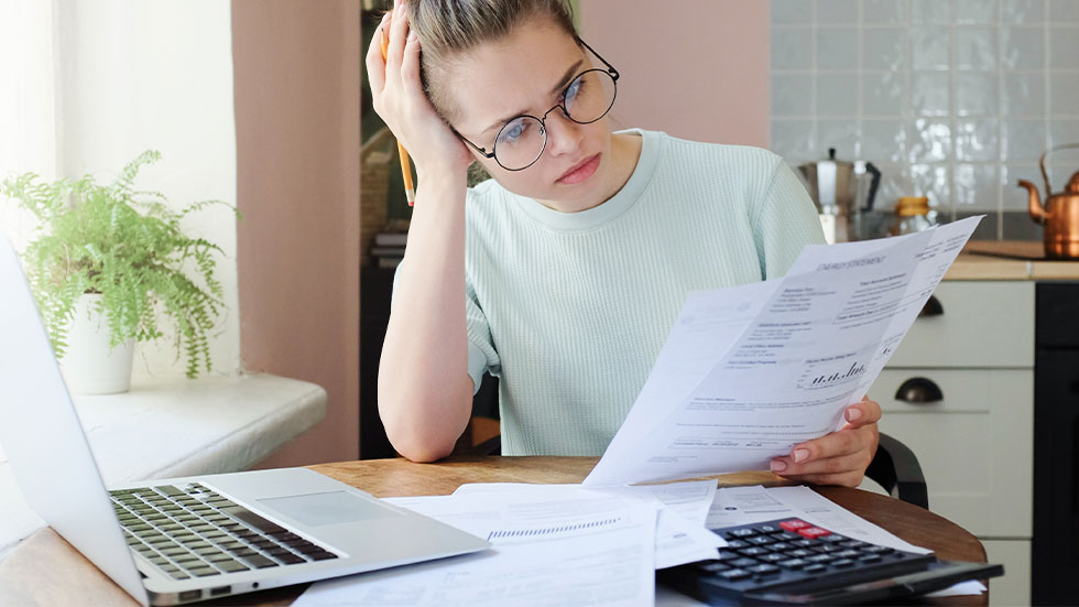 girl looking over documents