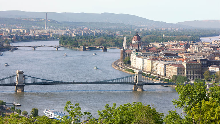 Panoramic view of the Danube River, Chain Bridge and Hungarian Parliament Building in Budapest.