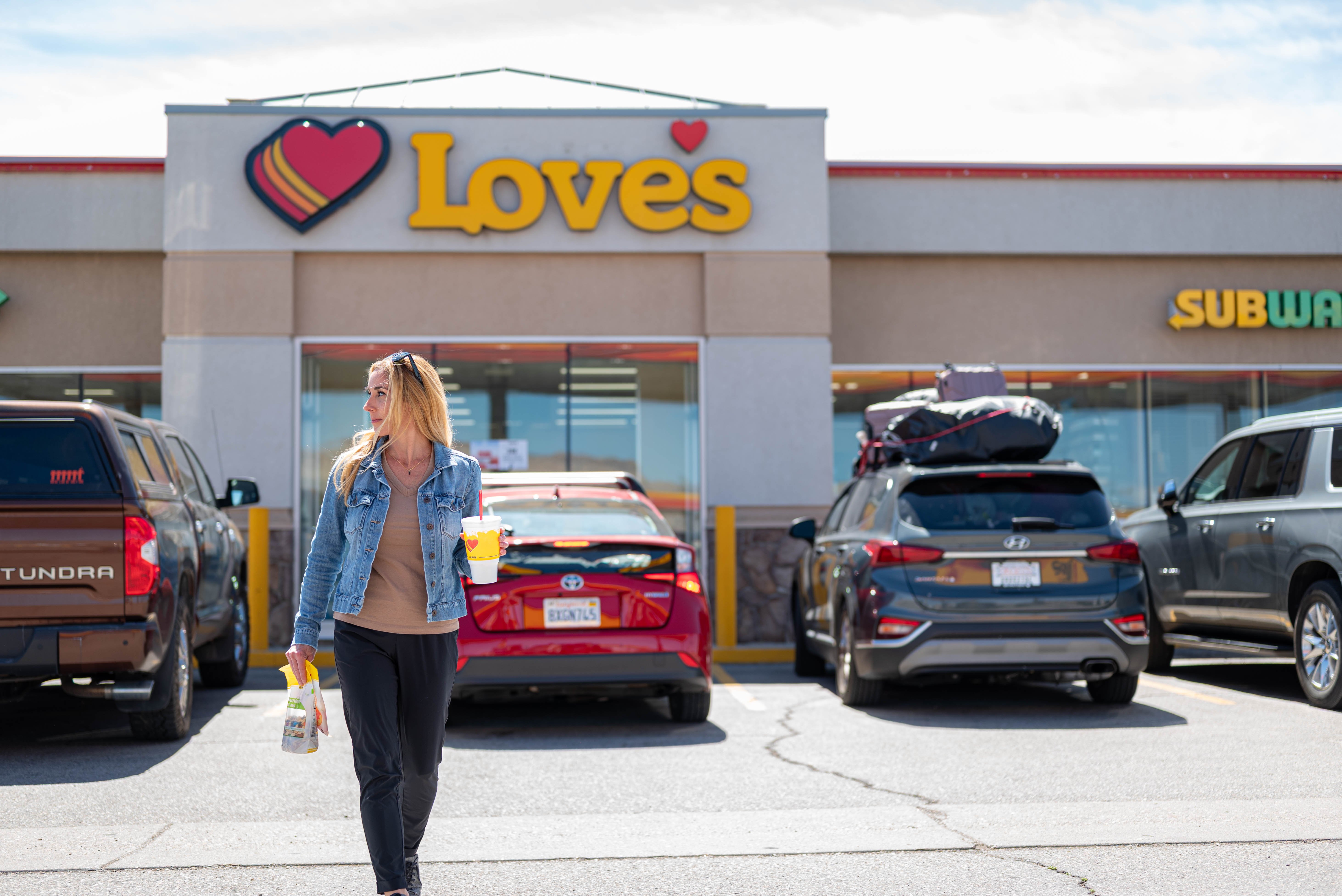 woman in front of Love's store