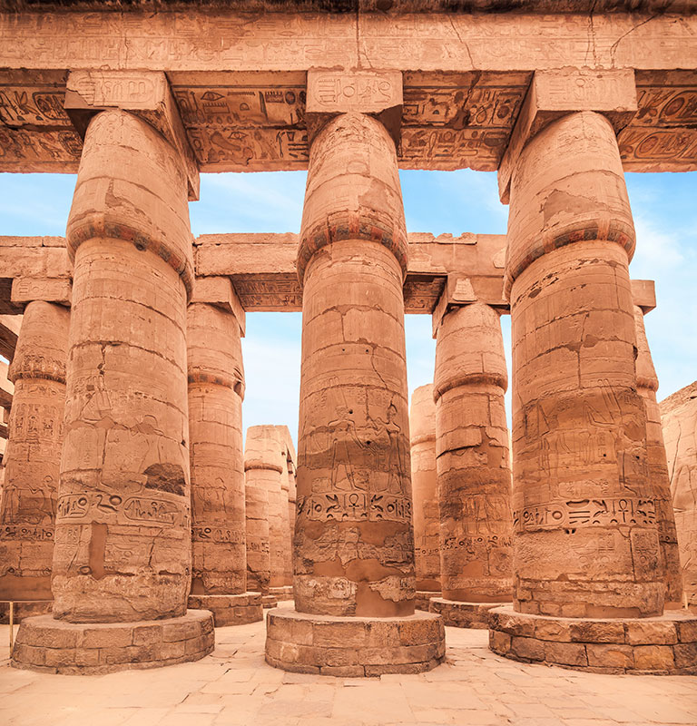 Great Hypostyle Hall and clouds at the Temples of Karnak (ancient Thebes). Luxor, Egypt; photo by Ahmed Saeed/iStock.com
