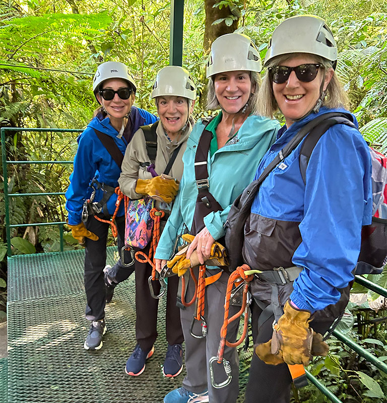 women getting ready to zipline