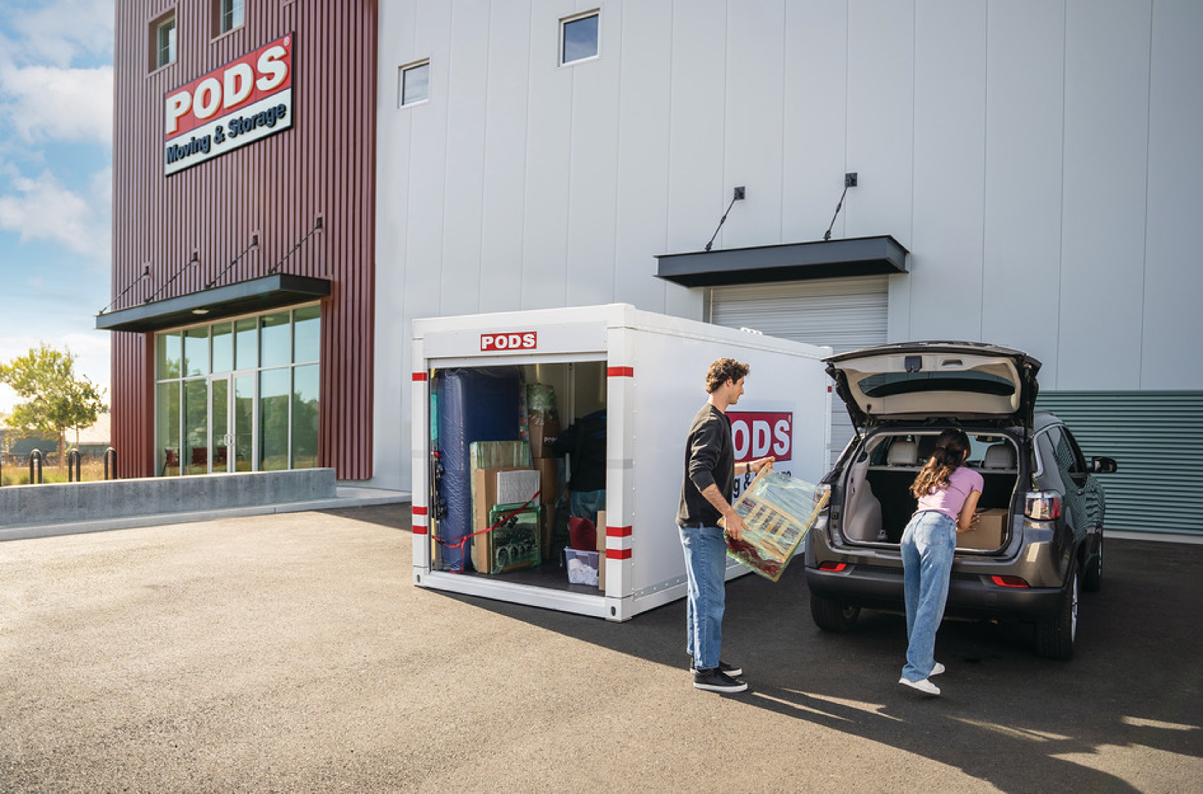 people packing PODS container
