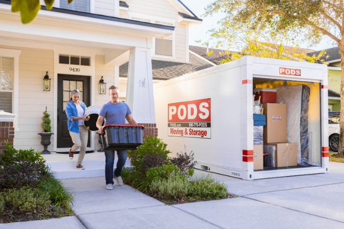 people moving things into pods container
