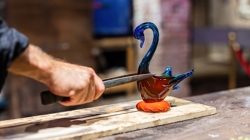 Glass blown swan being made in Italy