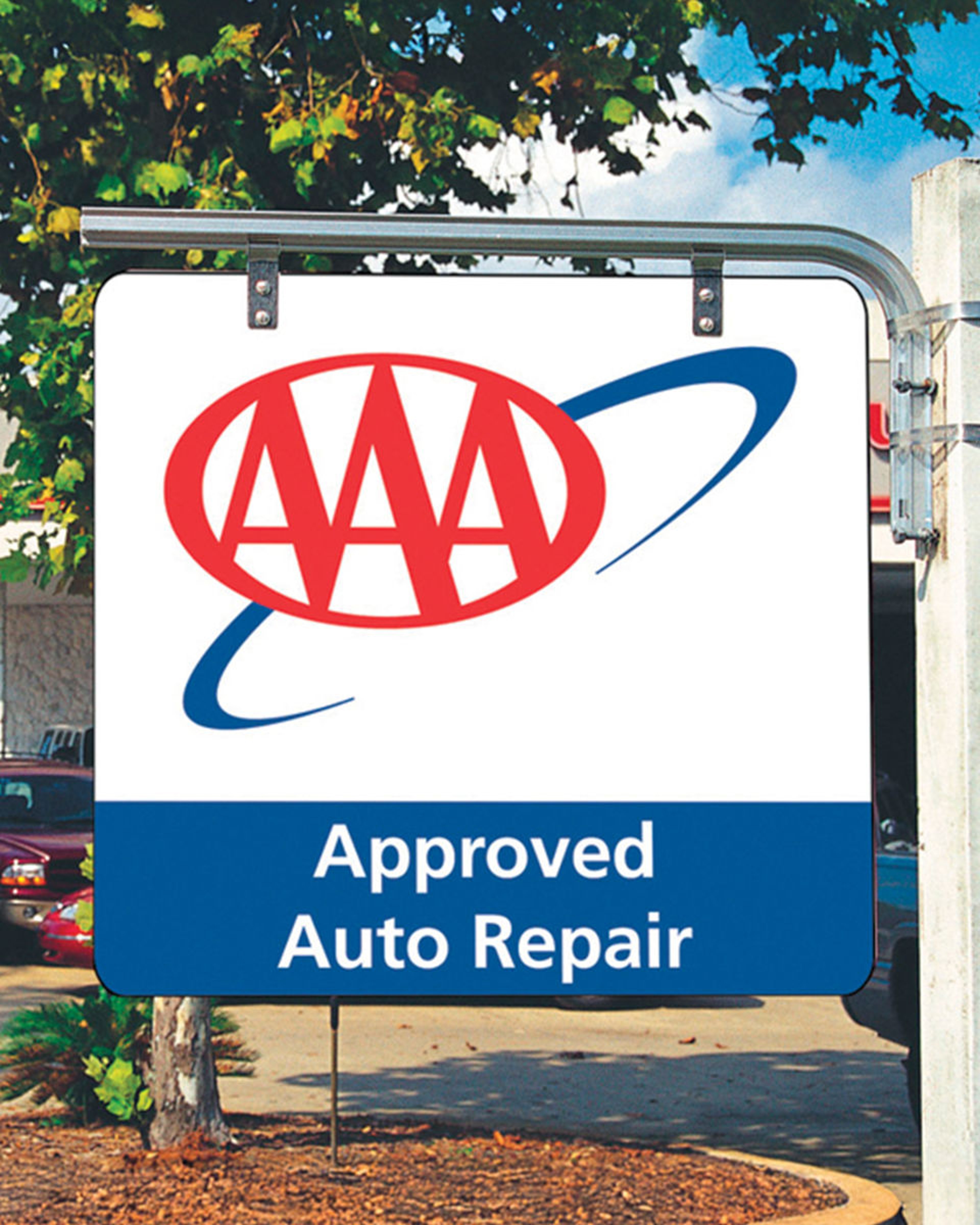 AAA Approved Roadside Service Provider Sign AAA approved auto repair sign in front of roadside assistance provider location
