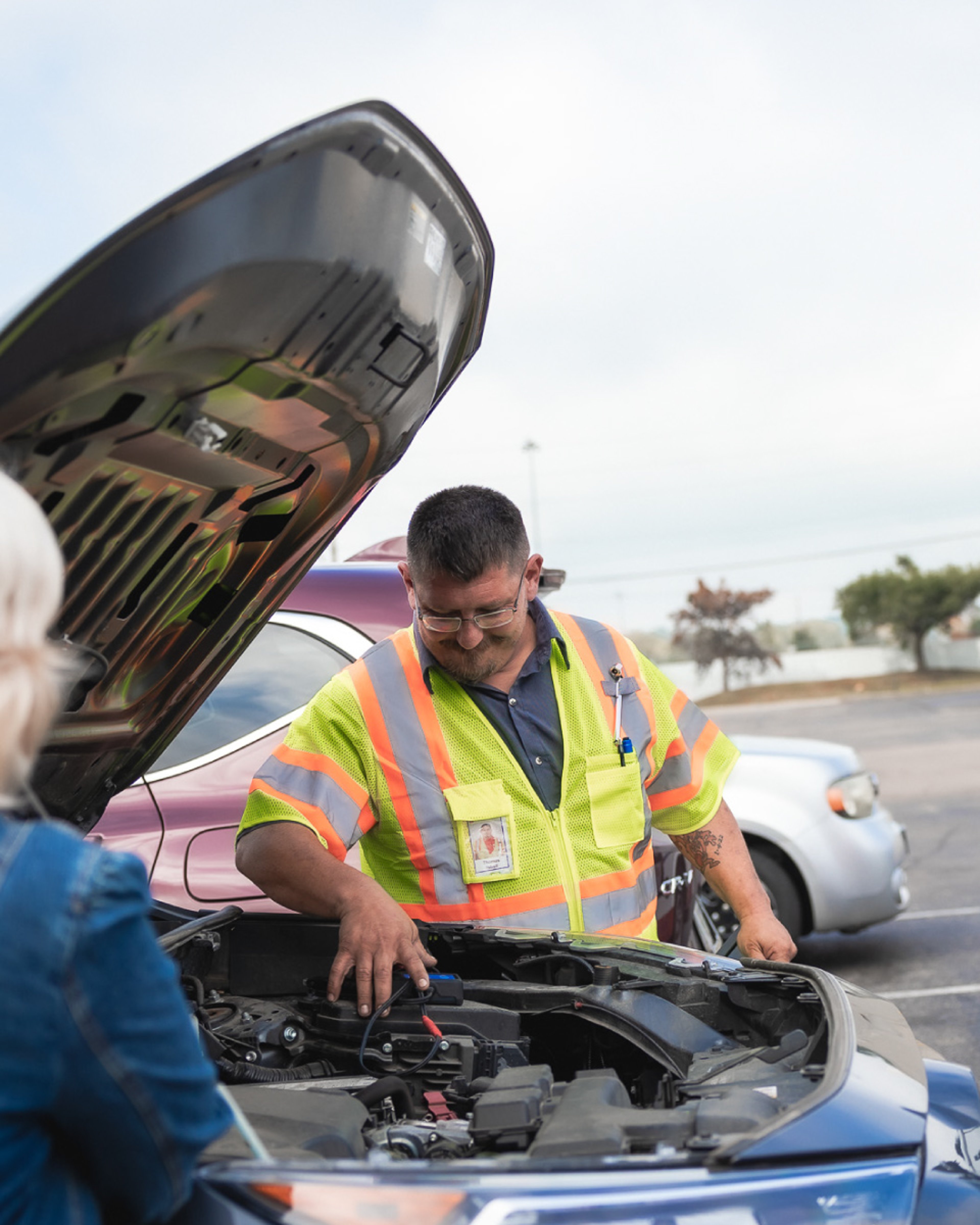 Man technician checking a car engine 