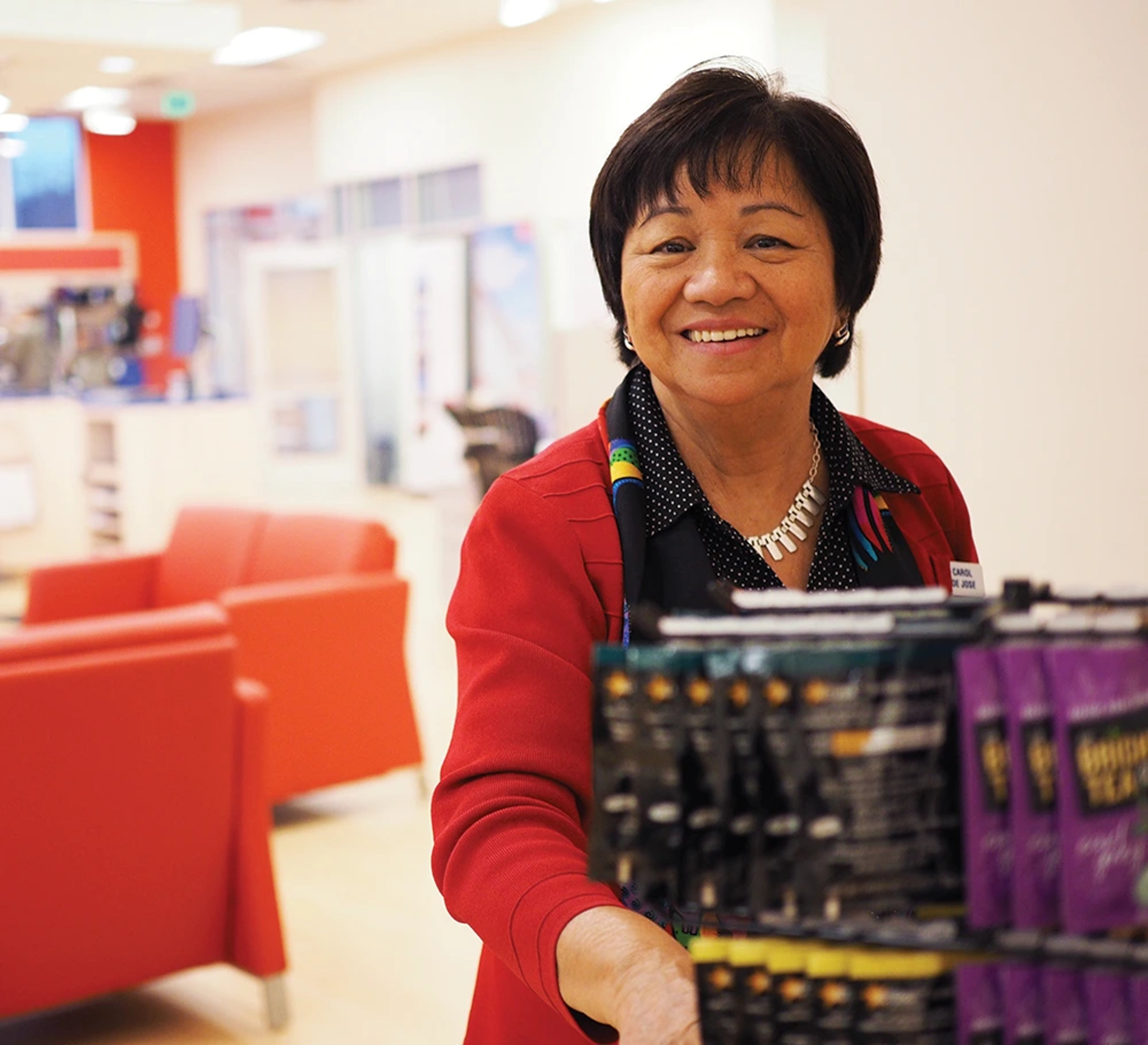 AAA retail associate working in AAA store