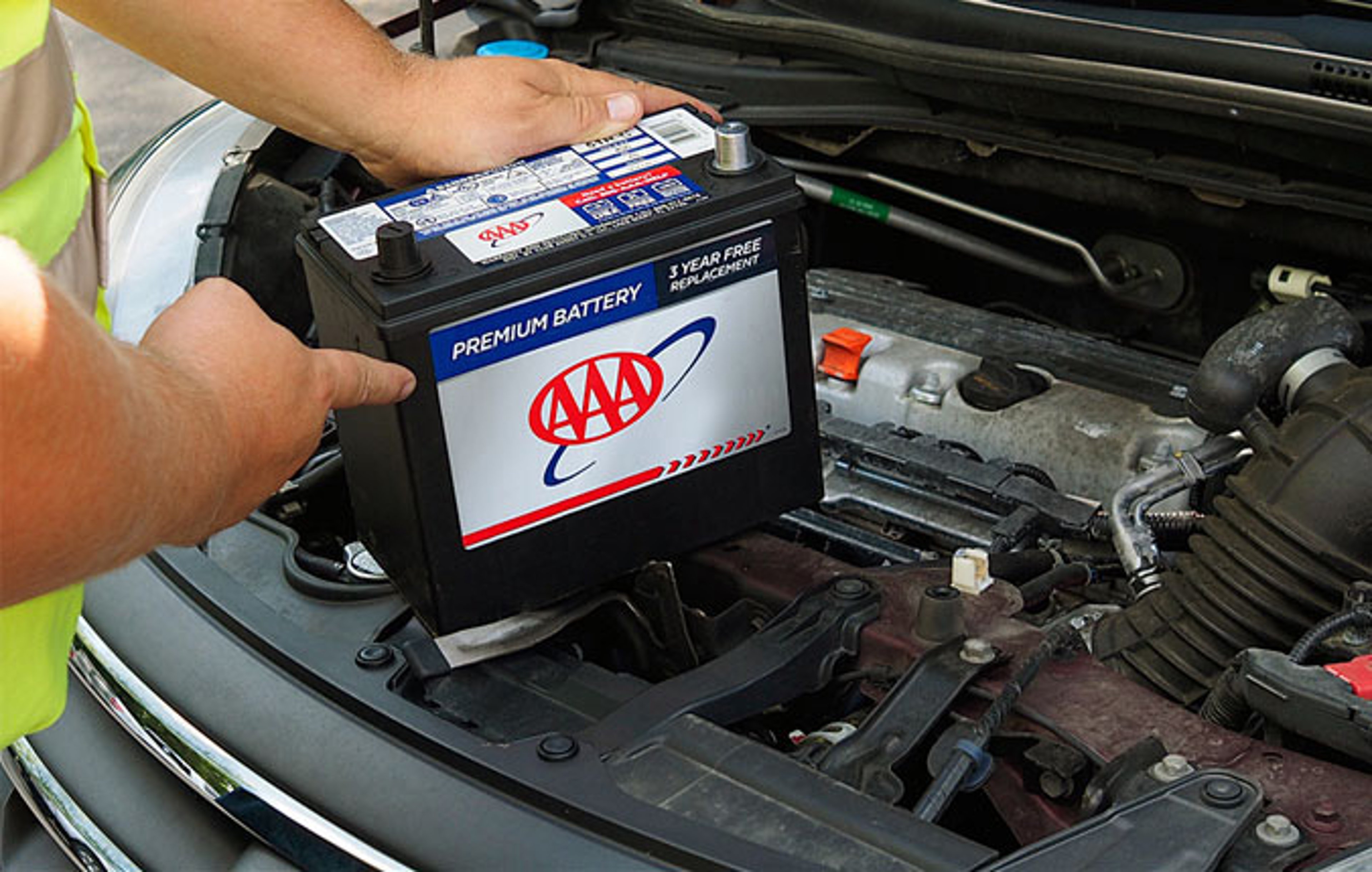 AAA Mobile Battery Service - AAA tech replacing car battery