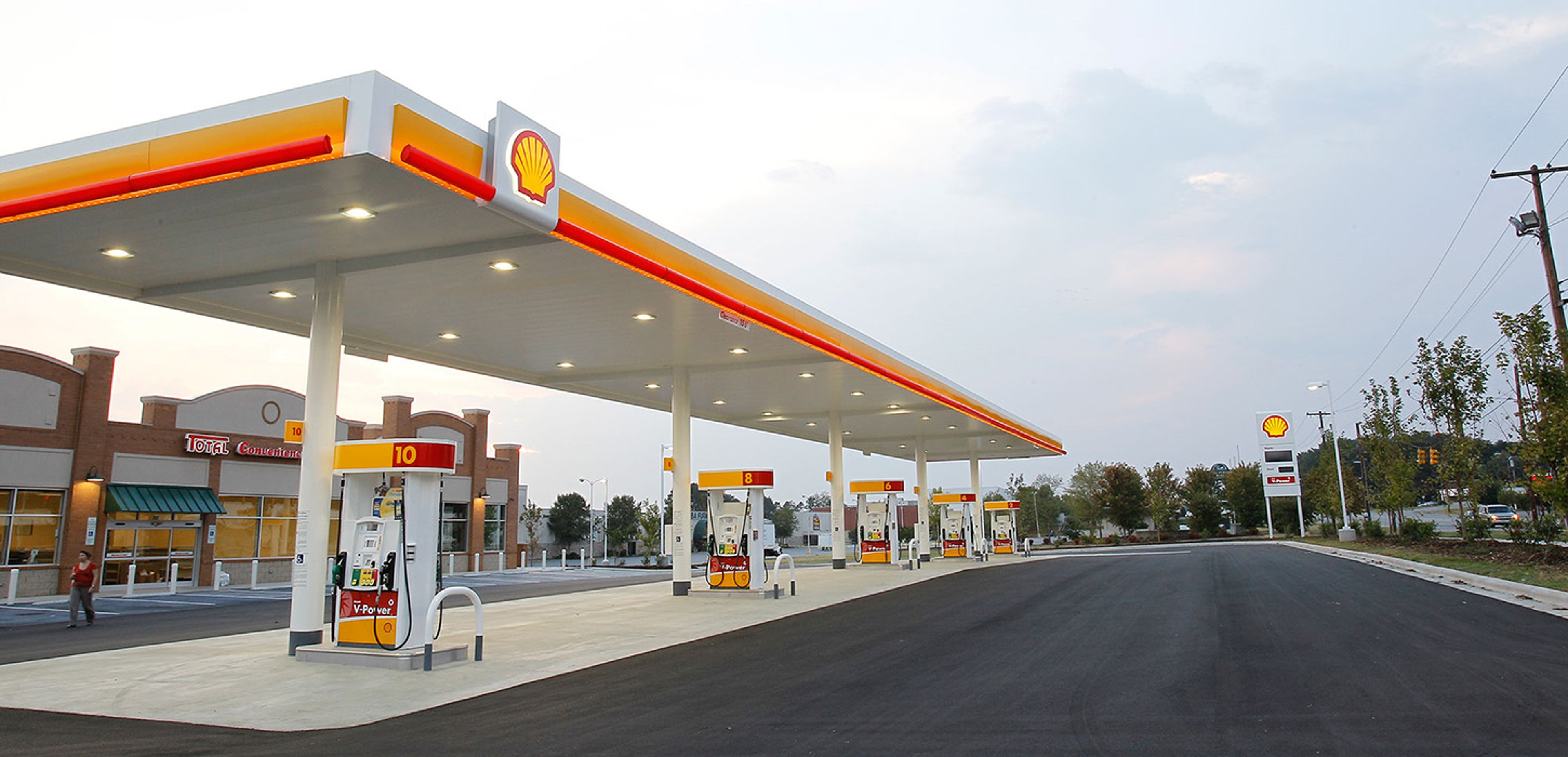 Exterior of Shell gas station and convenience store on side of road
