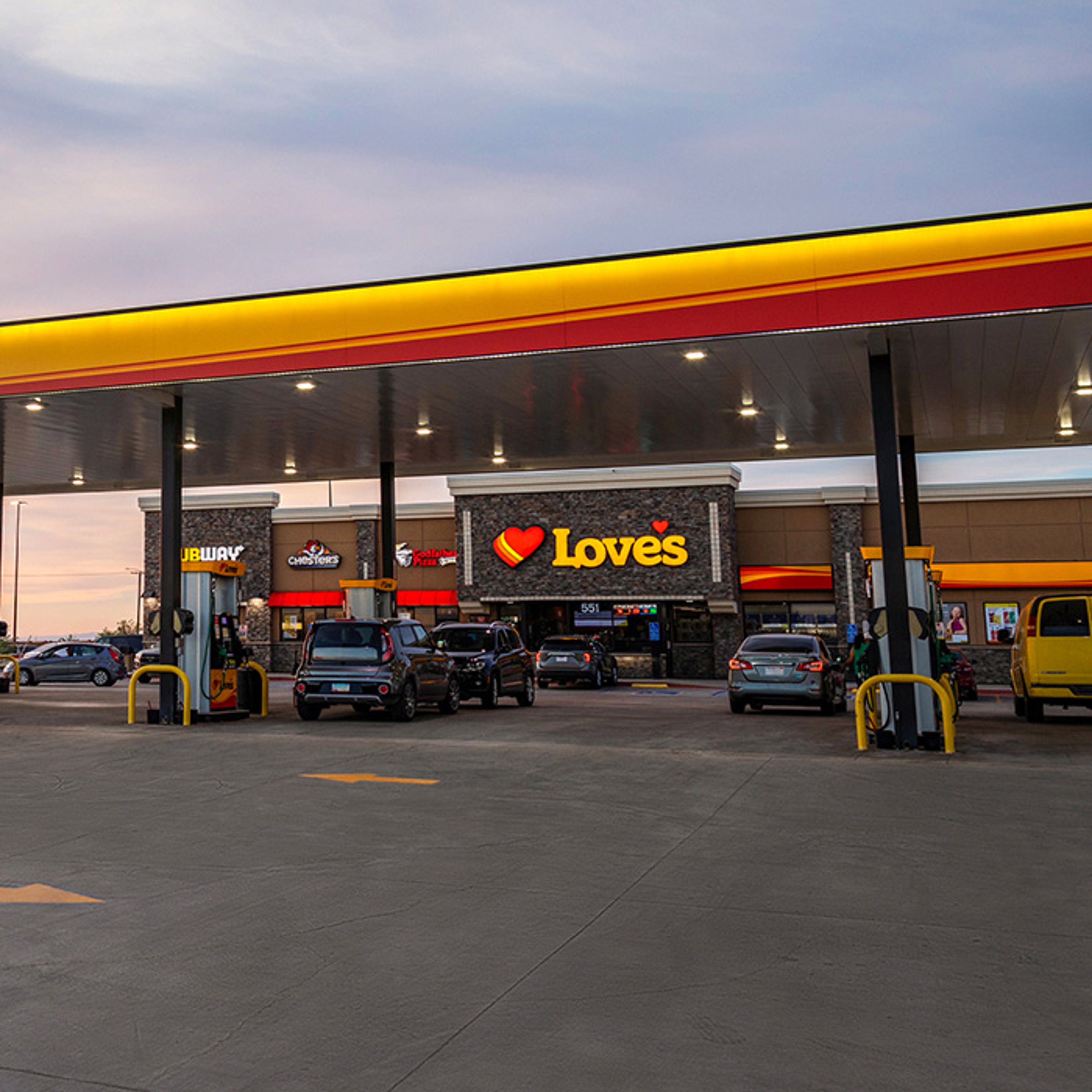 Lit up Love's gas station at dusk
