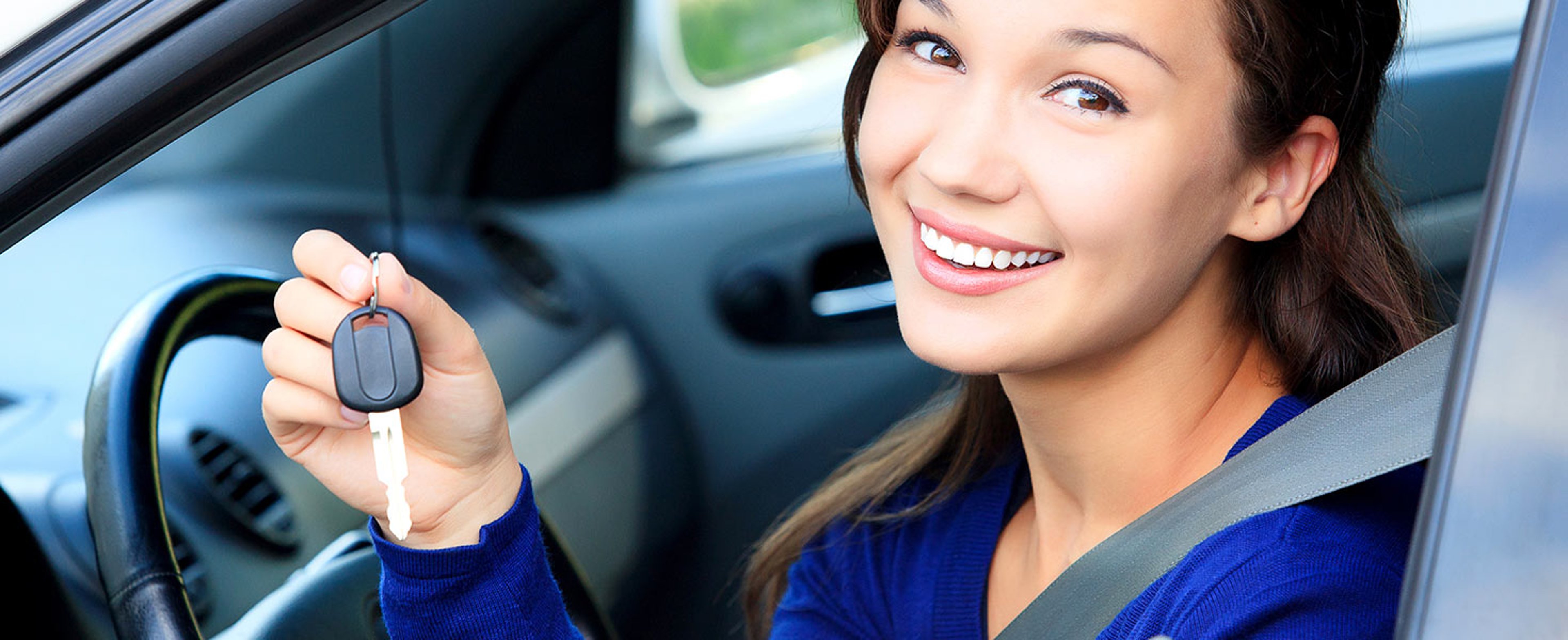 Teen driver  holding her car keys