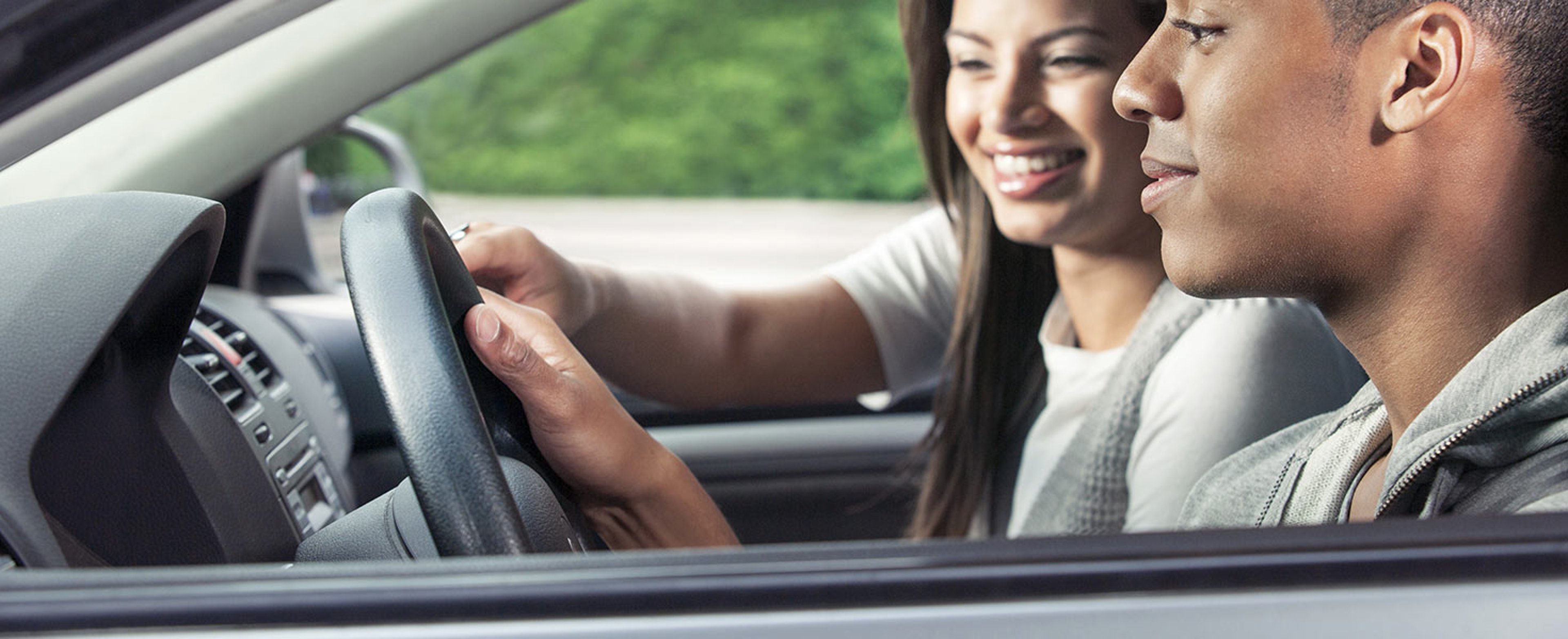 Teen drivers riding in a car together