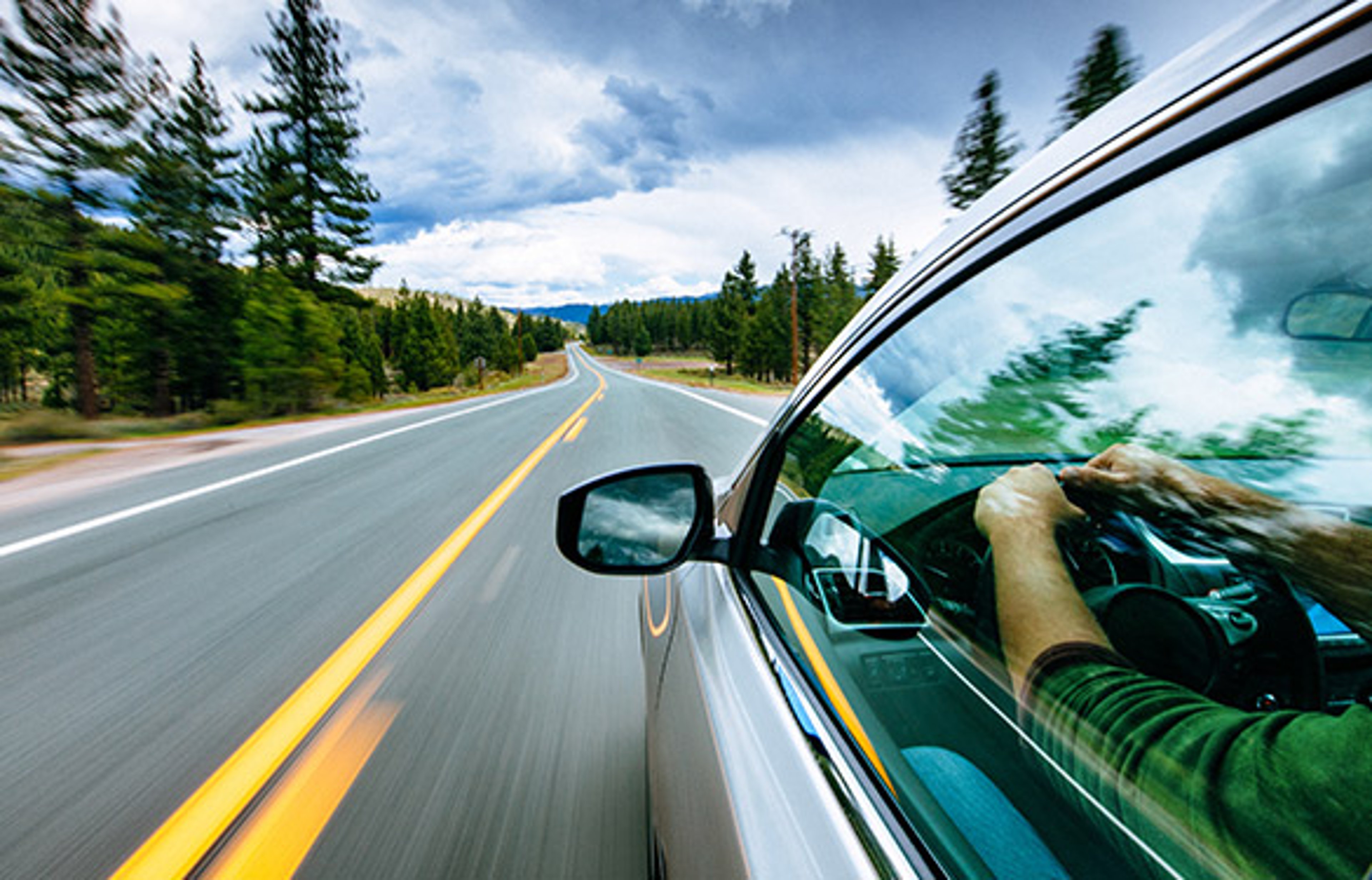 car driving on a country road