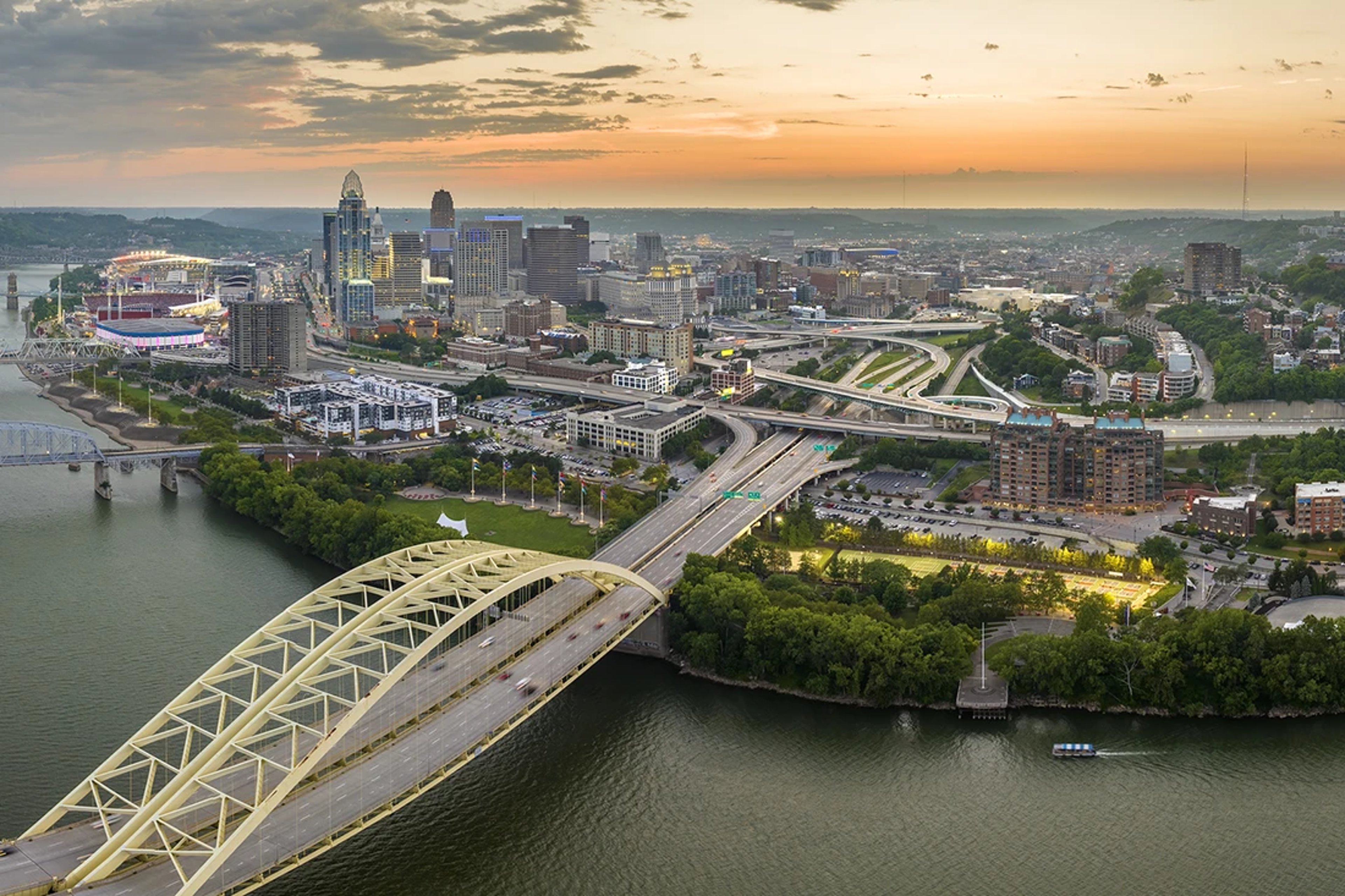 Cincy skyline and bridge at dusk