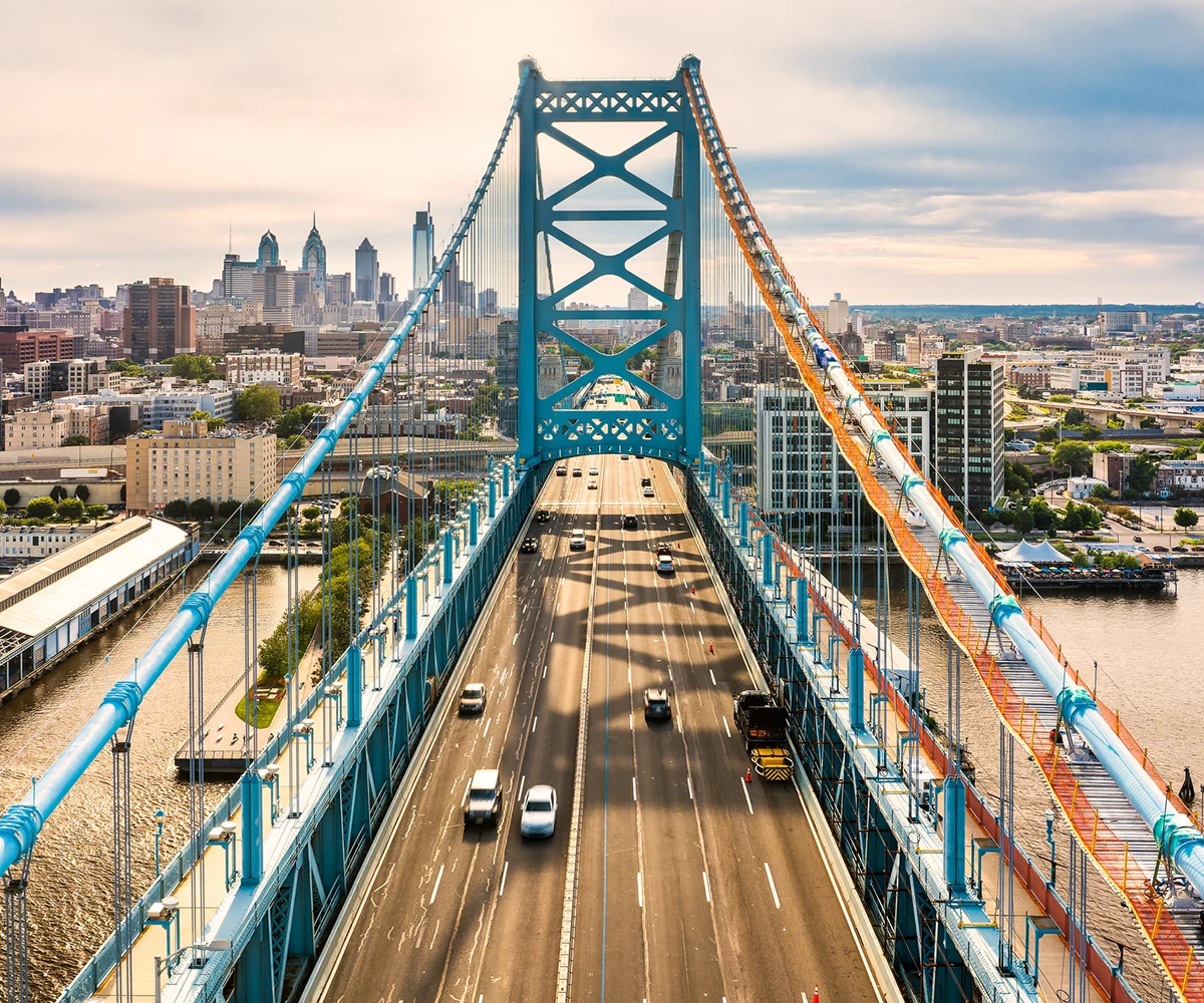 Cars driving over the Ben Franklin Bridge connecting New Jersey to Philadelphia