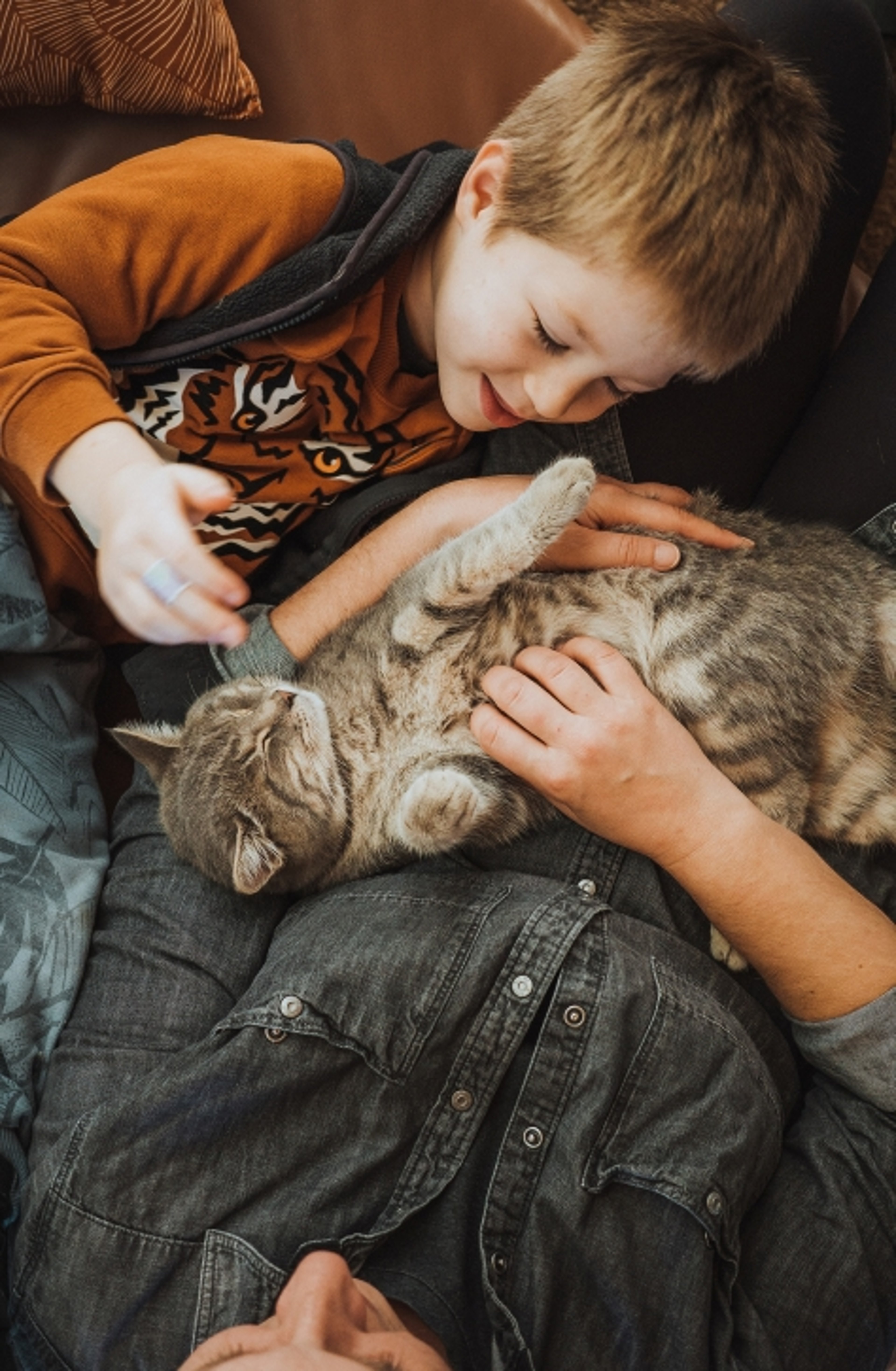 Mother and son with cat
