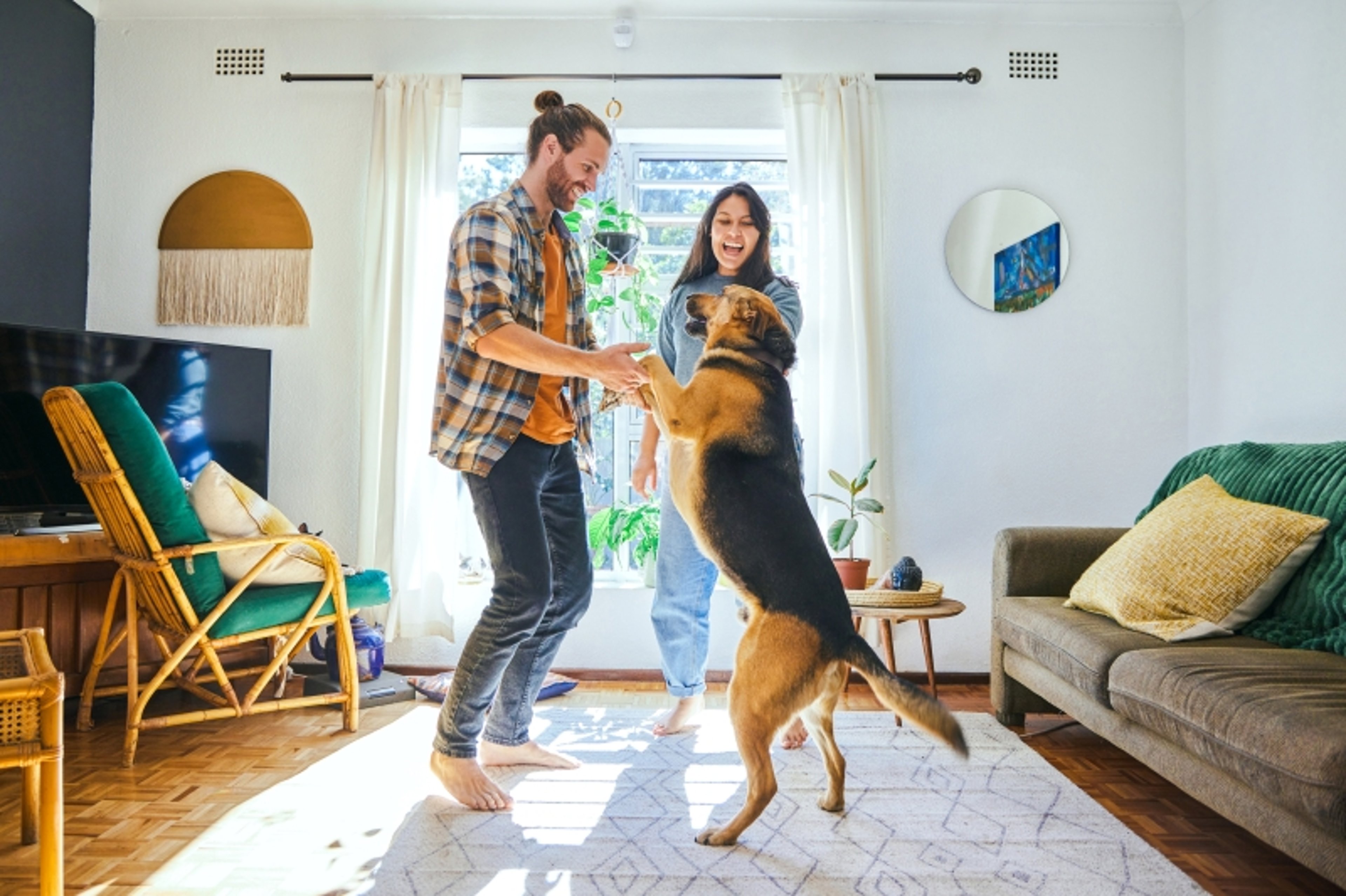 Couple dancing with dog
