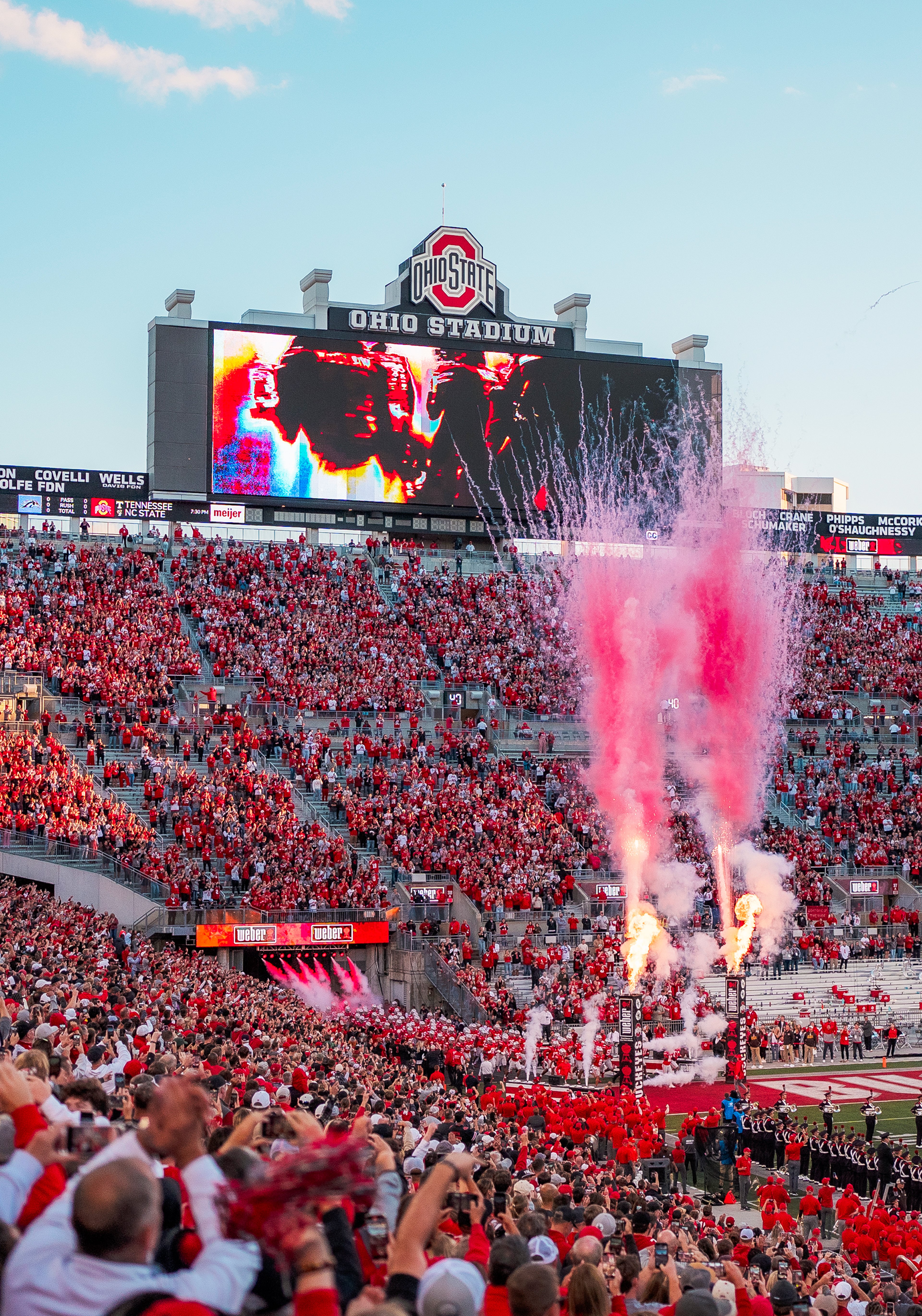 Ohio State University football stadium on game day with fireworks shooting from the back of the end zone