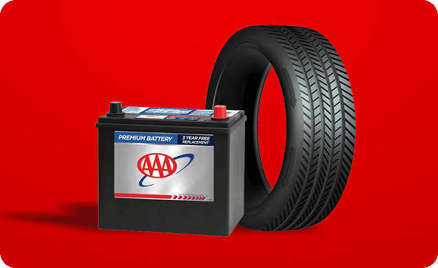 AAA premium car battery and a tire