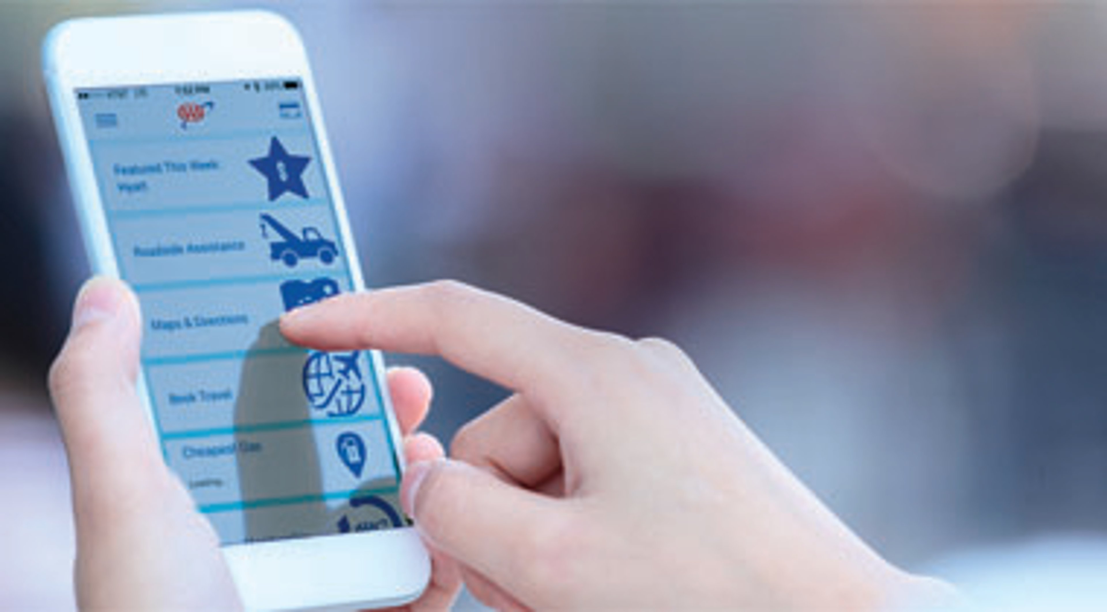Person on AAA Mobile App with their smartphone.