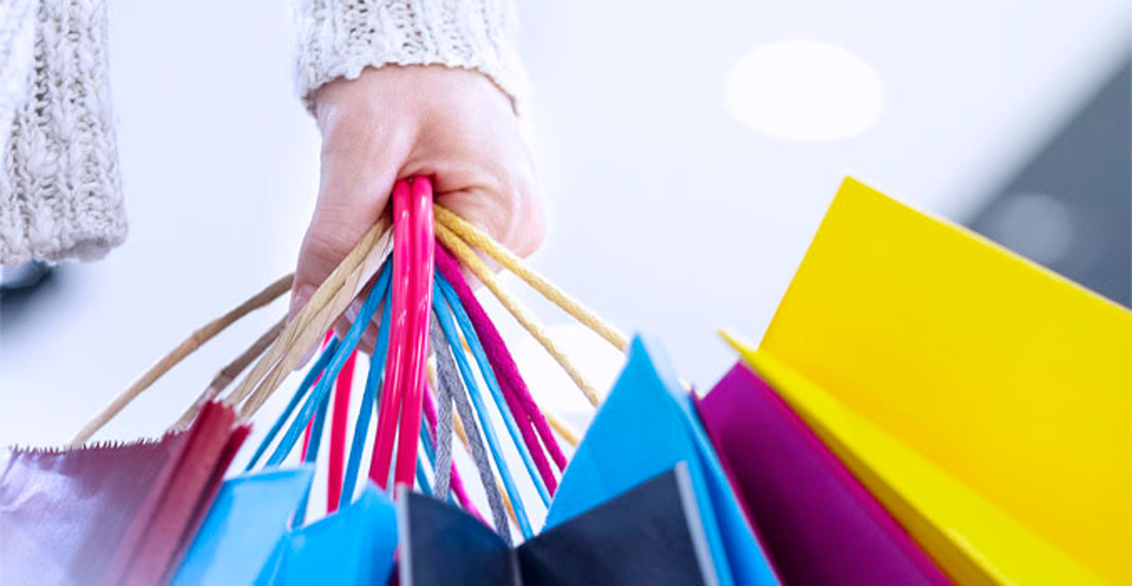 Person shopping with bags in their hands