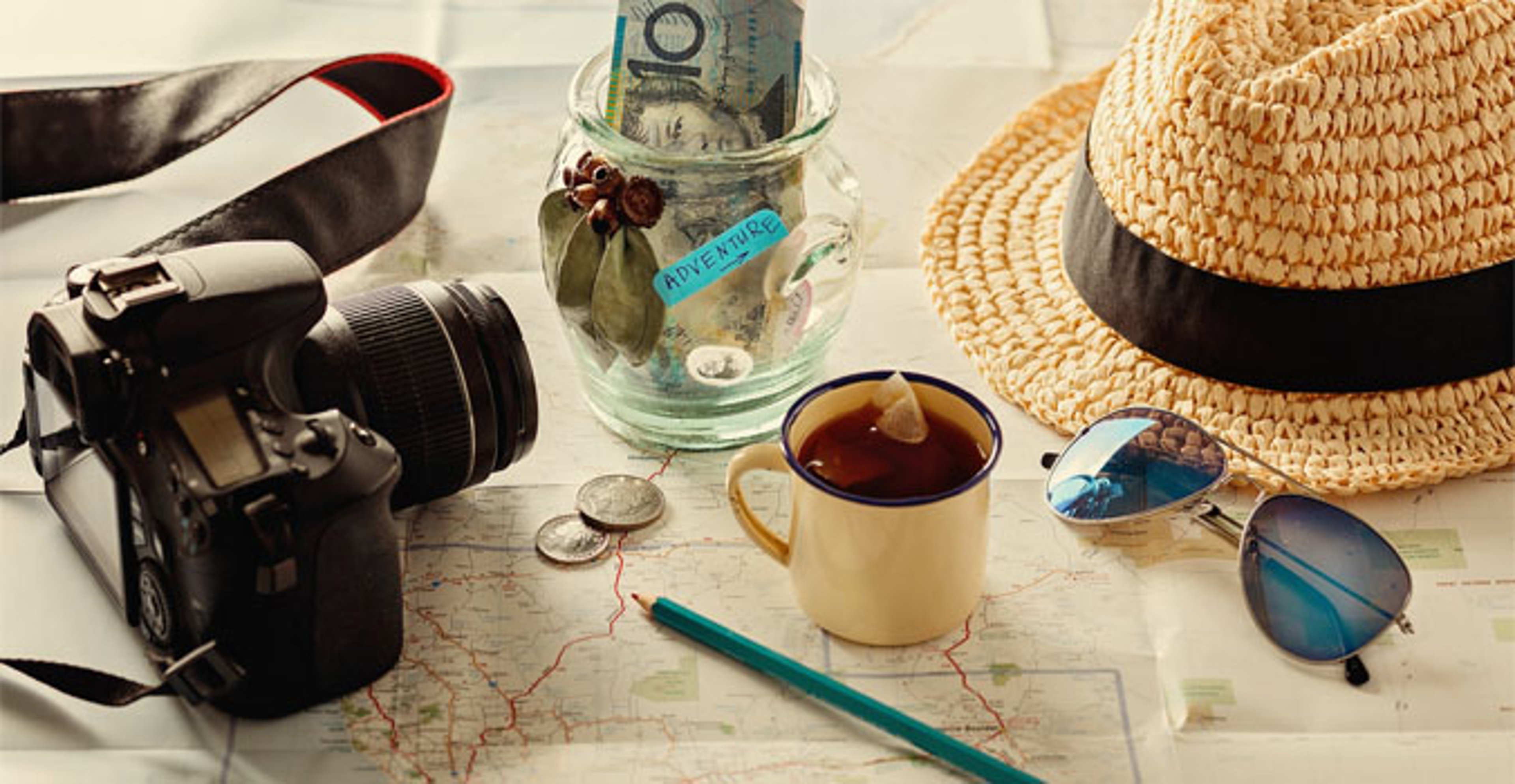 Travel accessories on top of map