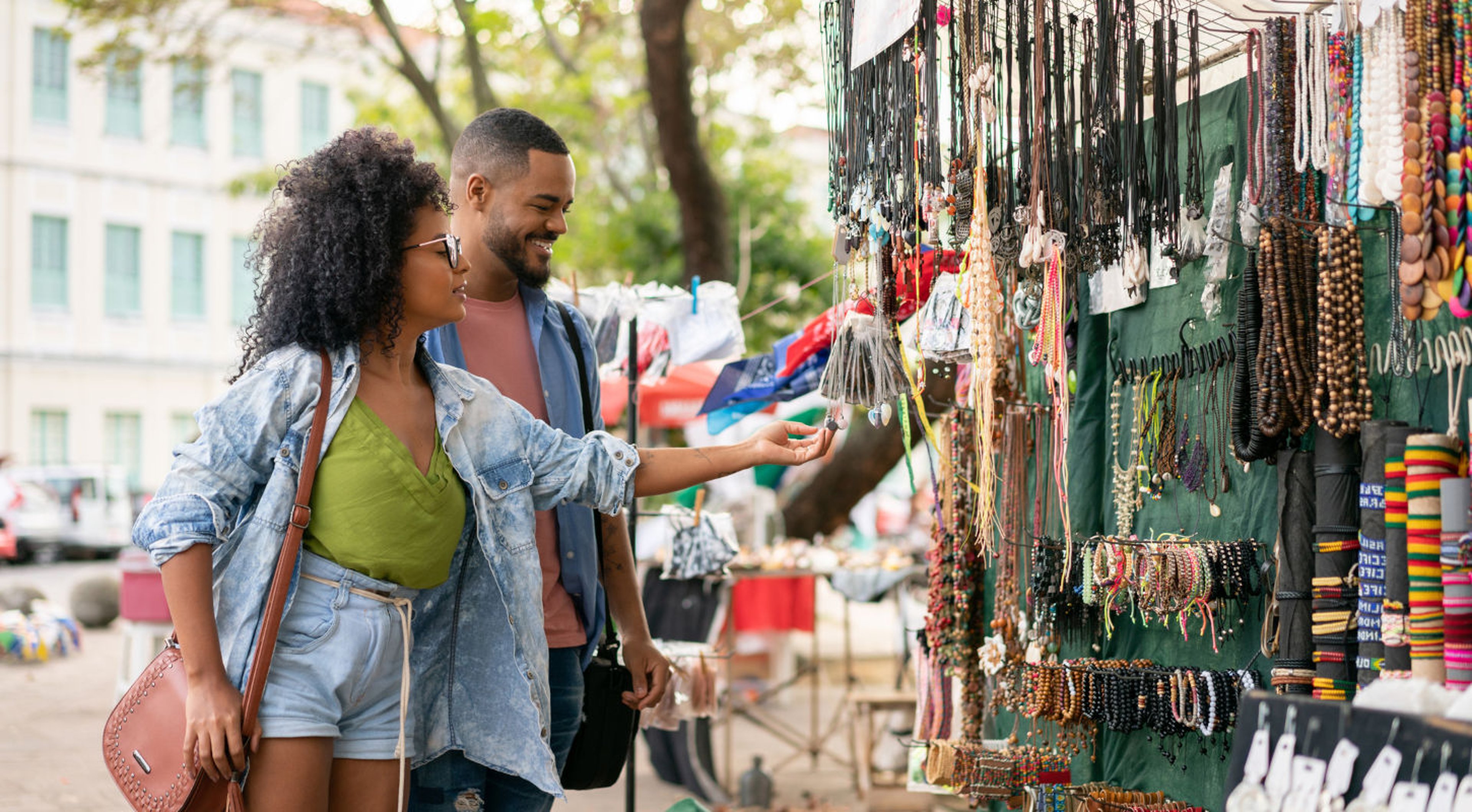 AAA Foreign Currency Couple Couple shopping in an Olinda handicraft market