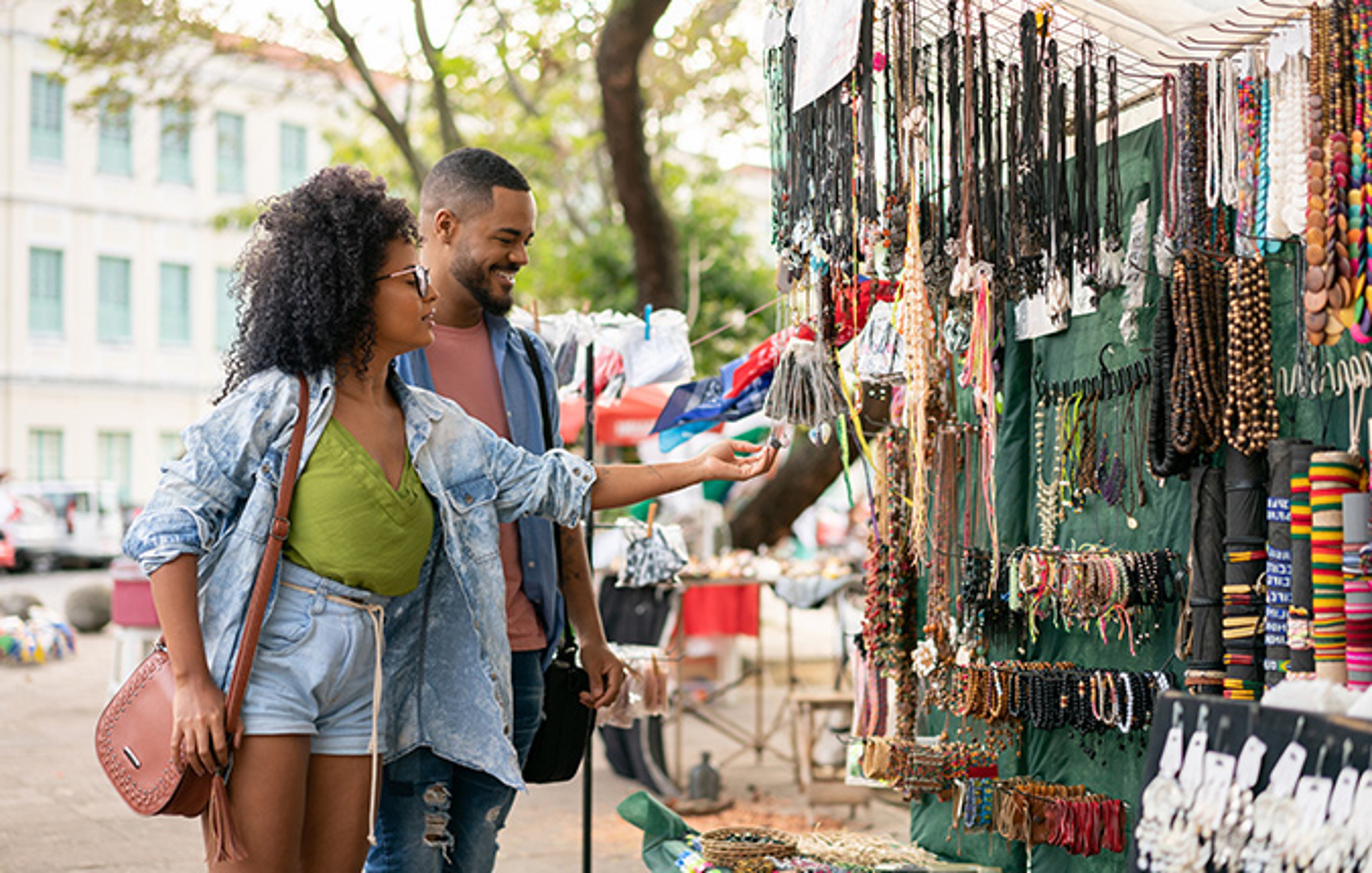 Couple shopping in an Olinda handicraft market