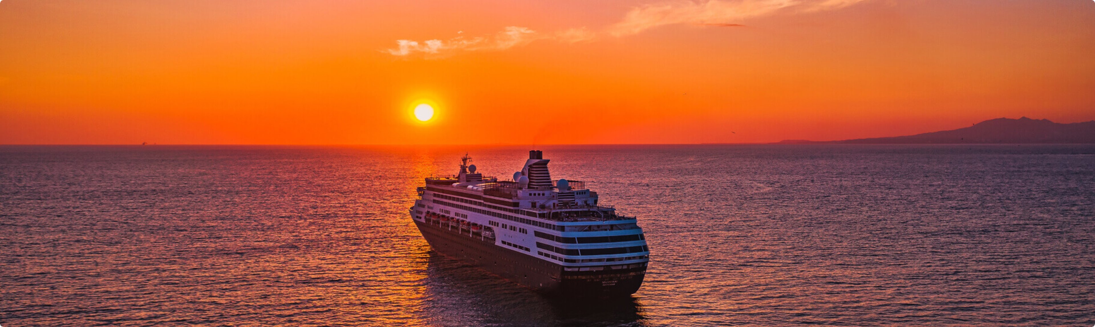 A majestic cruise ship sailing into a breathtaking sunset on the horizon.