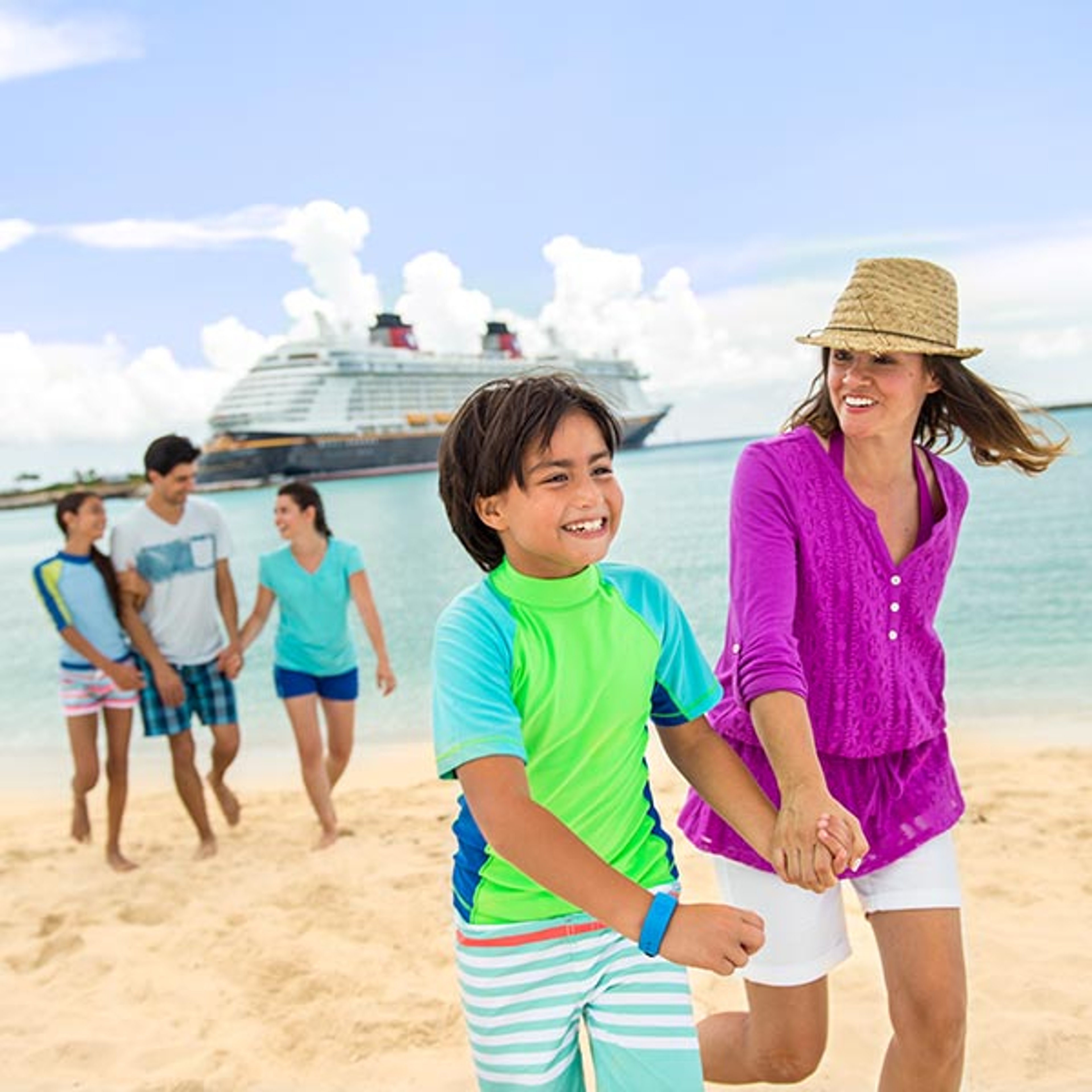 Family on beach at Disney's private island