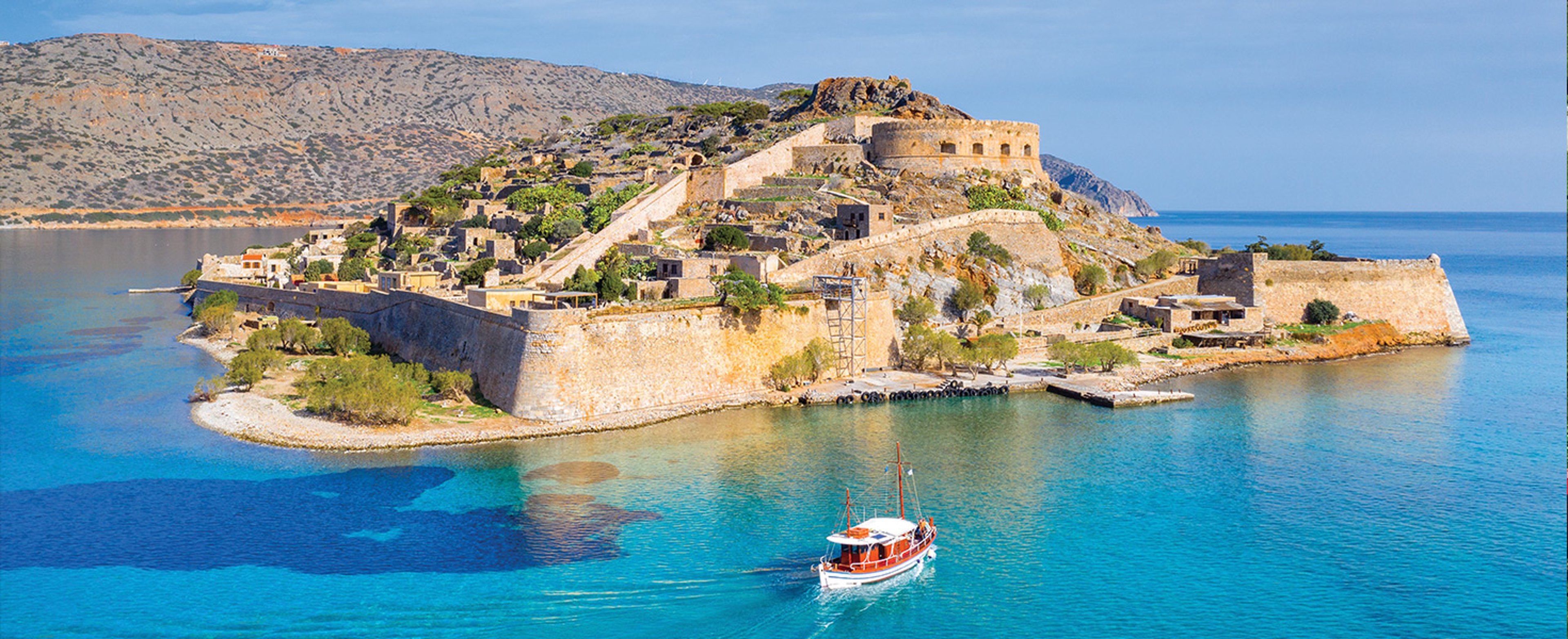 Spinalonga is a historic island located in the Gulf of Elounda off the northeast coast of Crete, Greece