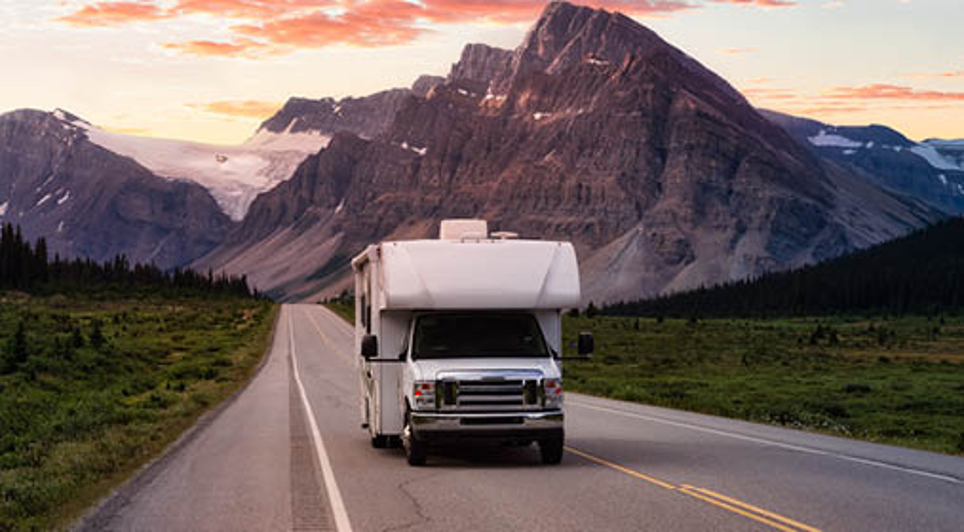 RV driving down mountain road