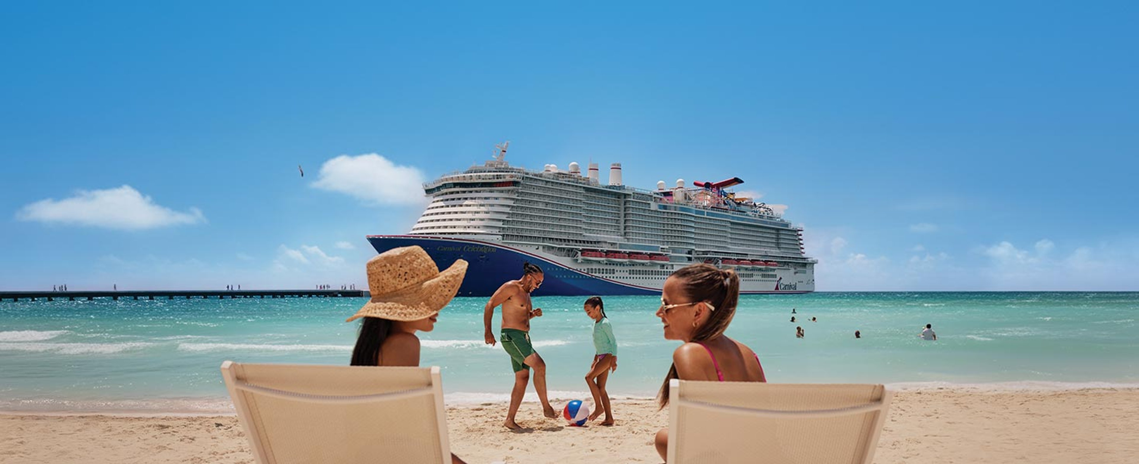Cruisers enjoying Calypso Beach with a Carnival cruise ship in the background